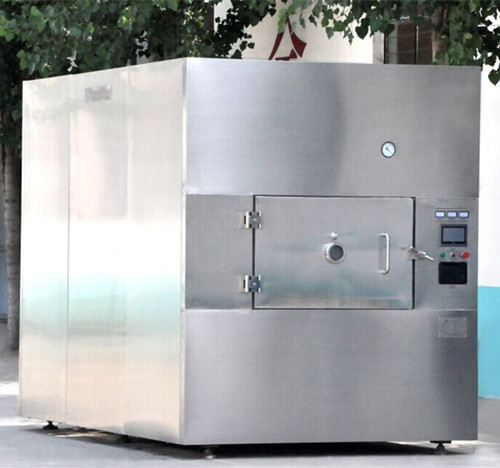 Vacuum microwave drying machine