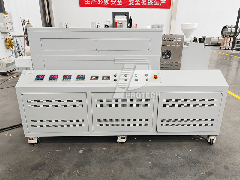 Actual photo of the rotating tube furnace with three temperature zones for the special material hopper